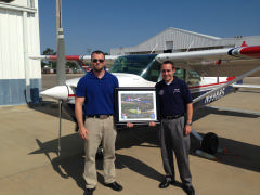 Maj. Bailey presents Mr. Ingalls a special gift.